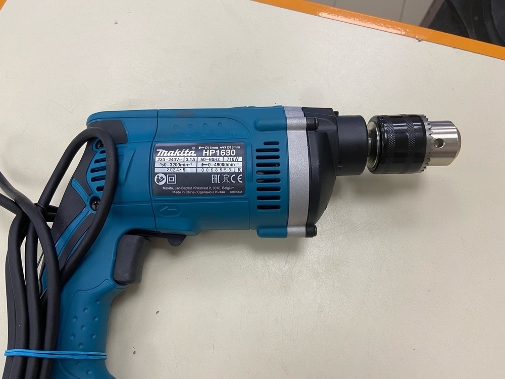 Дрель-ударная Makita HP1630.