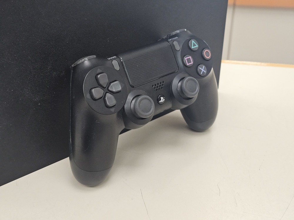 Игровая приставка PlayStation 4 Pro 1Tb Игровая приставка PlayStation 4 Pro 1Tb