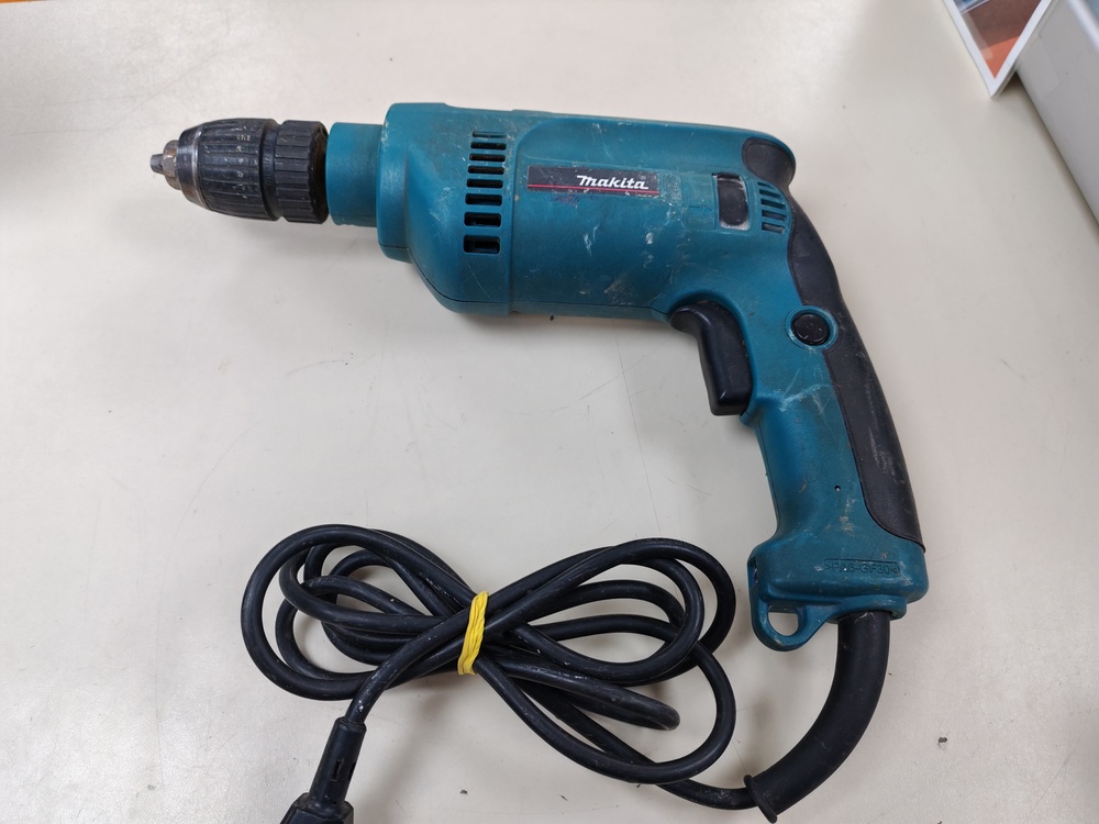 Дрель-ударная Makita HP1621F
