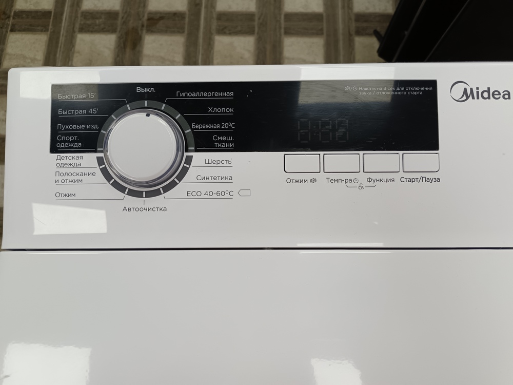 Стиральная машина Midea MFE05W70/W-RU