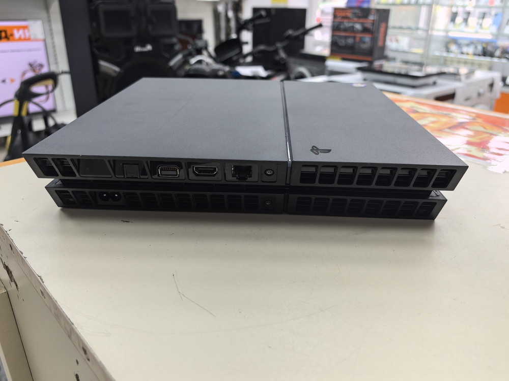 Игровая приставка PlayStation 4 FAT 1Tb Игровая приставка PlayStation 4 FAT 1Tb
