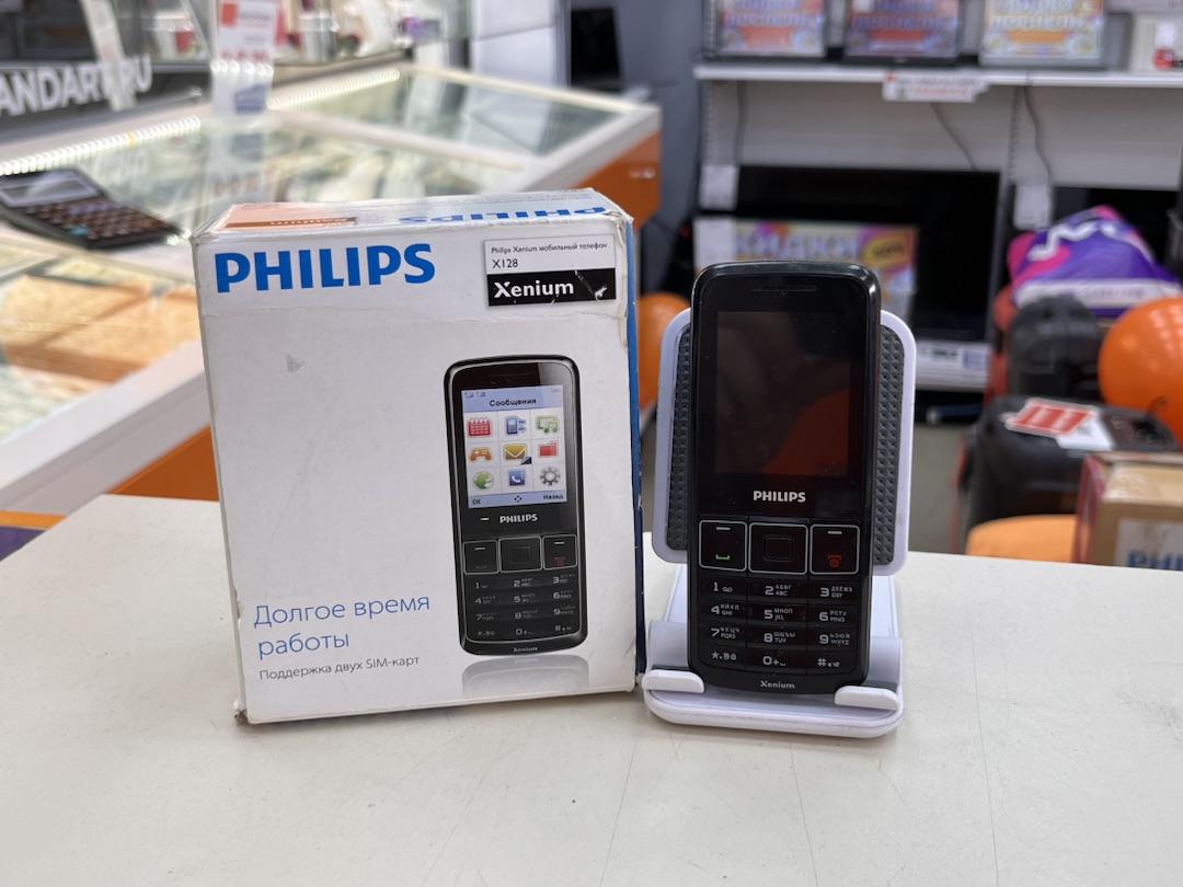 Мобильный телефон Philips X128