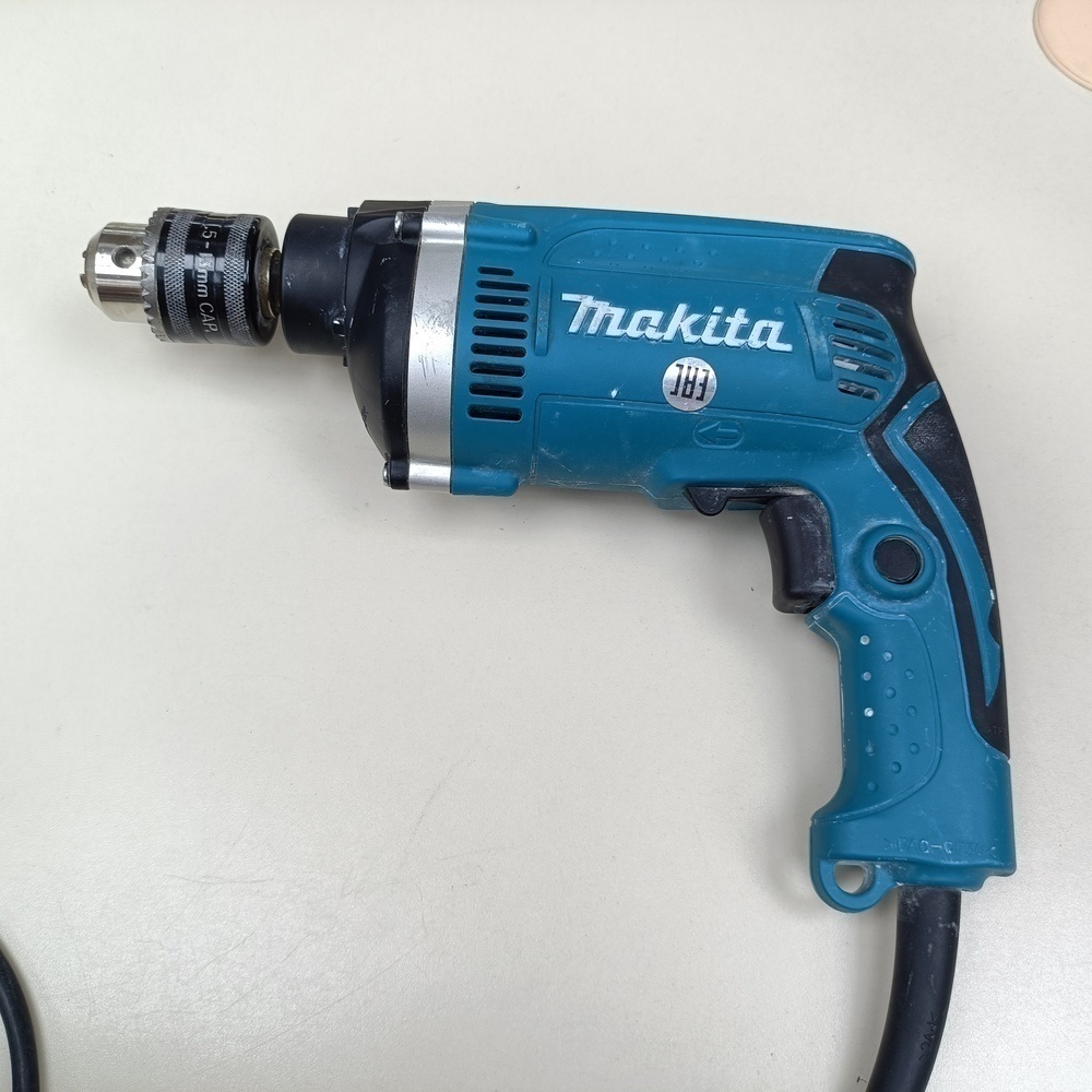 Дрель-ударная Makita HP1630.