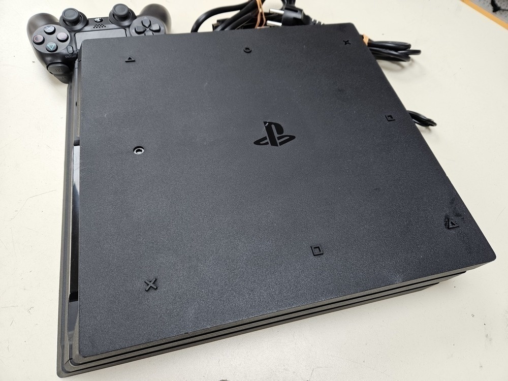 Игровая приставка PlayStation 4 Pro 1Tb Игровая приставка PlayStation 4 Pro 1Tb