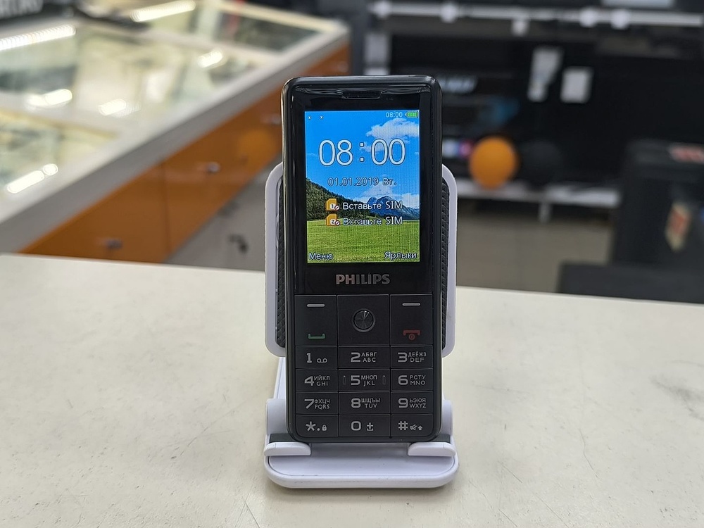 Мобильный телефон Philips Е169