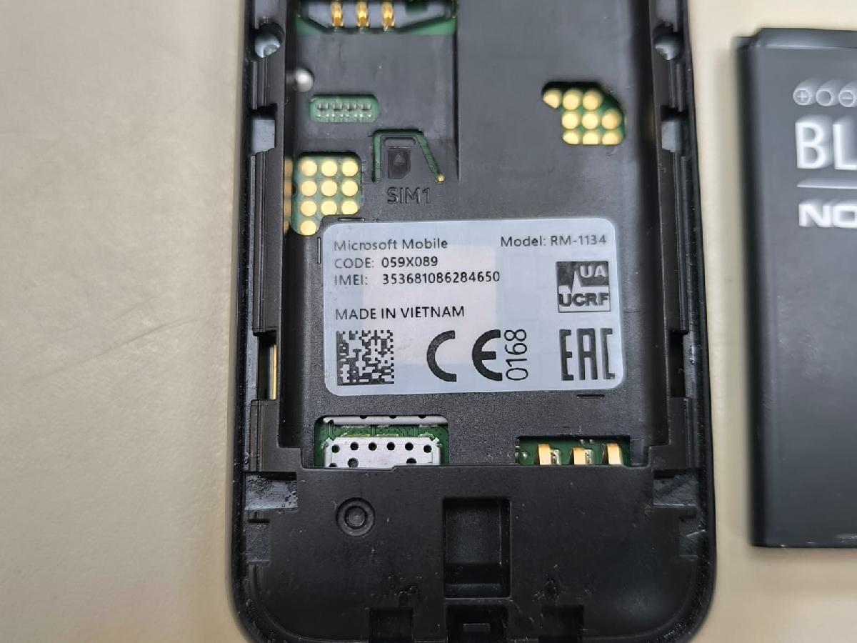 Мобильный телефон Nokia RM-1035