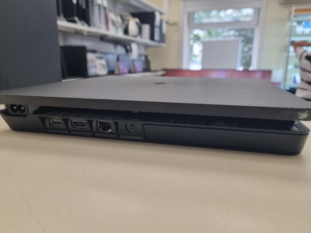 Игровая приставка PlayStation 4 Slim 1Tb Игровая приставка PlayStation 4 Slim 1Tb