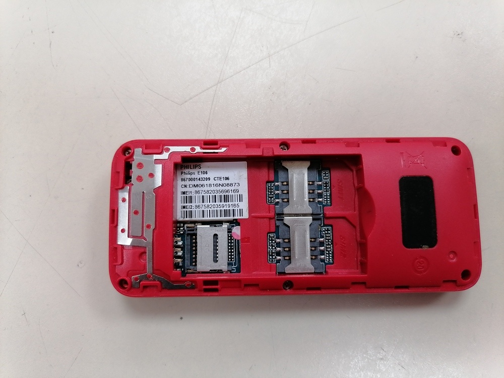 Мобильный телефон Philips E106