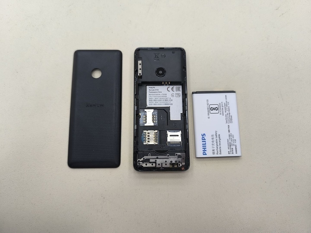 Мобильный телефон Philips Е169