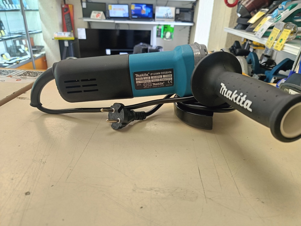 Угловая шлифмашина Makita 9558HN