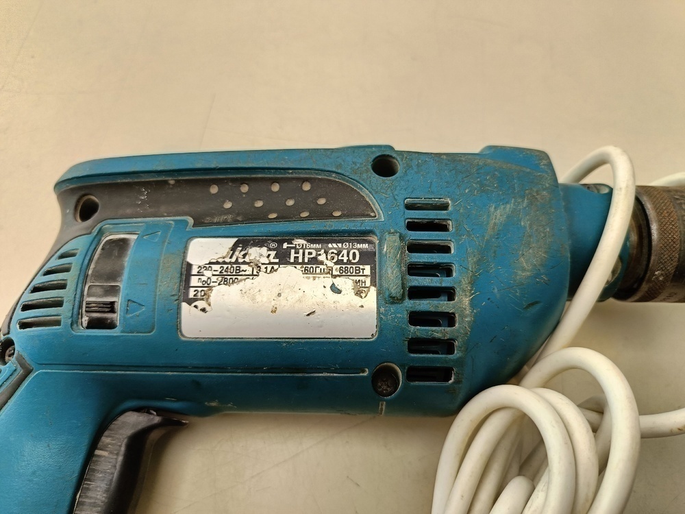 Дрель-ударная Makita HP1640