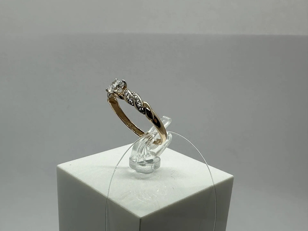 КОЛЬЦО С КАМНЯМИ (Au 585)