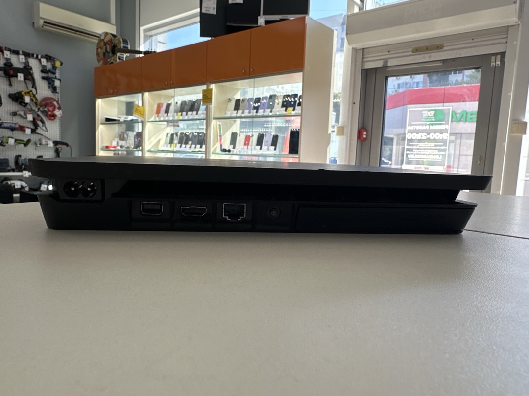 Игровая приставка PlayStation 4 Slim 1Tb Игровая приставка PlayStation 4 Slim 1Tb