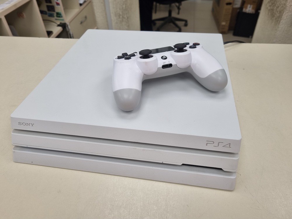 Игровая приставка PlayStation 4 Pro 1Tb Игровая приставка PlayStation 4 Pro 1Tb