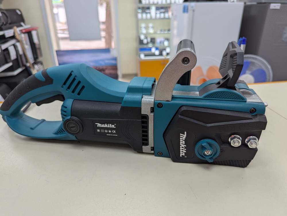 Электропила Makita UC4042ASP