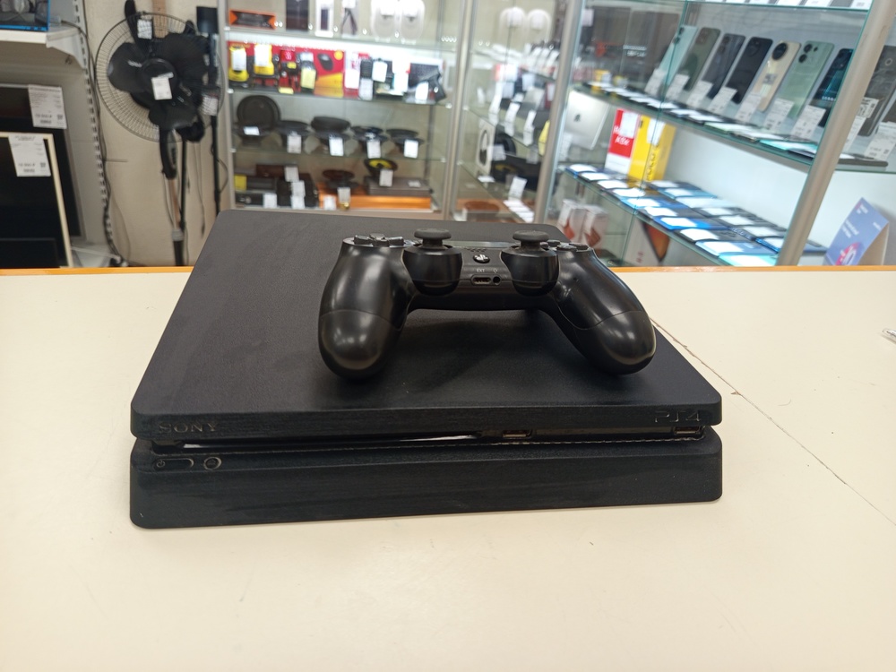 Игровая приставка PlayStation 4 Slim 1Tb Игровая приставка PlayStation 4 Slim 1Tb