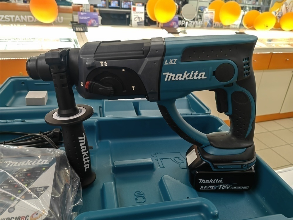 Перфоратор Makita DHR202;