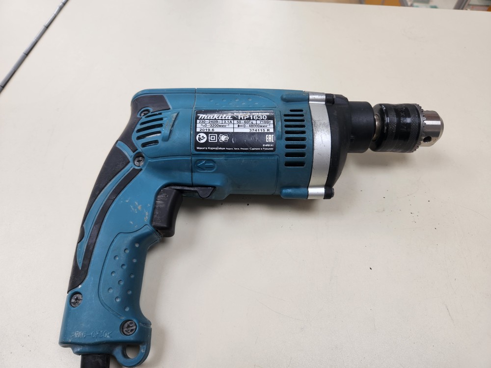 Дрель-ударная Makita HP1630.