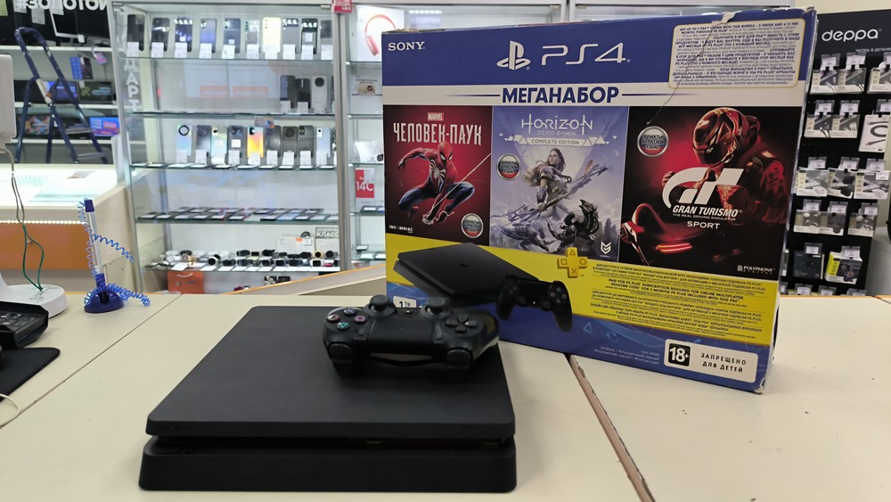 Игровая приставка PlayStation 4 Slim 1Tb Игровая приставка PlayStation 4 Slim 1Tb