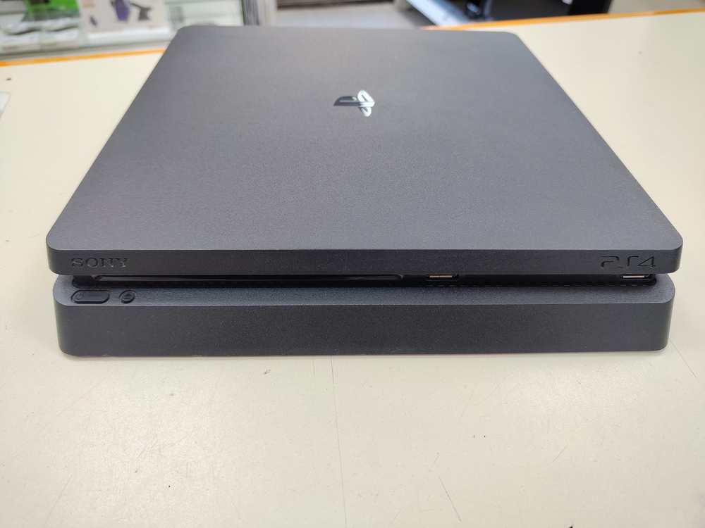 Игровая приставка PlayStation 4 Slim 1Tb Игровая приставка PlayStation 4 Slim 1Tb