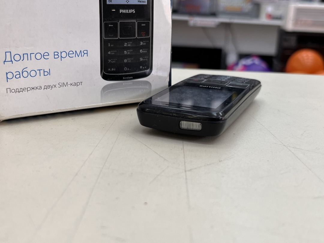Мобильный телефон Philips X128