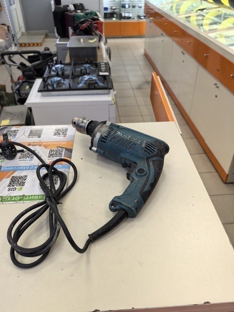 Дрель-ударная Makita HP1630.