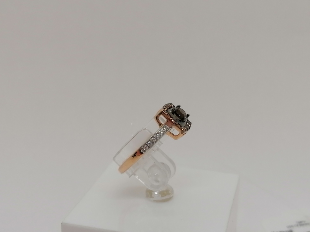 КОЛЬЦО РАУХ ТОПАЗ с камнями (Au 585)