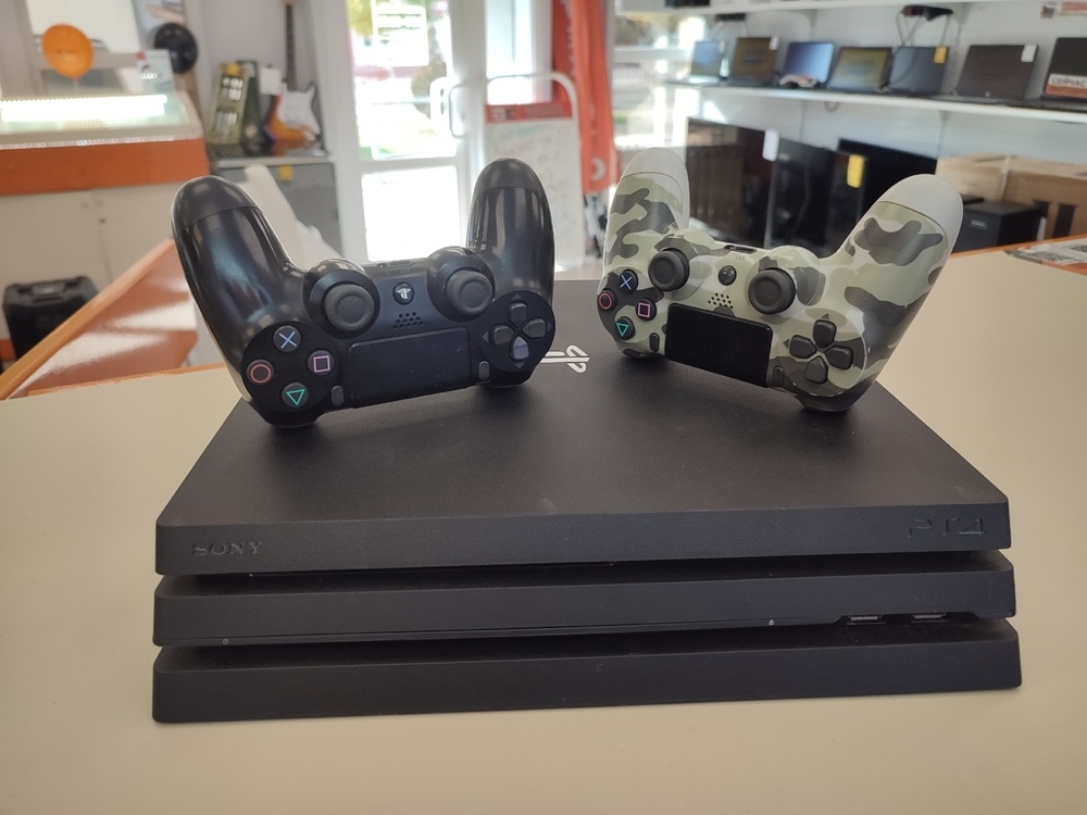 Игровая приставка PlayStation 4 Pro 1Tb Игровая приставка PlayStation 4 Pro 1Tb