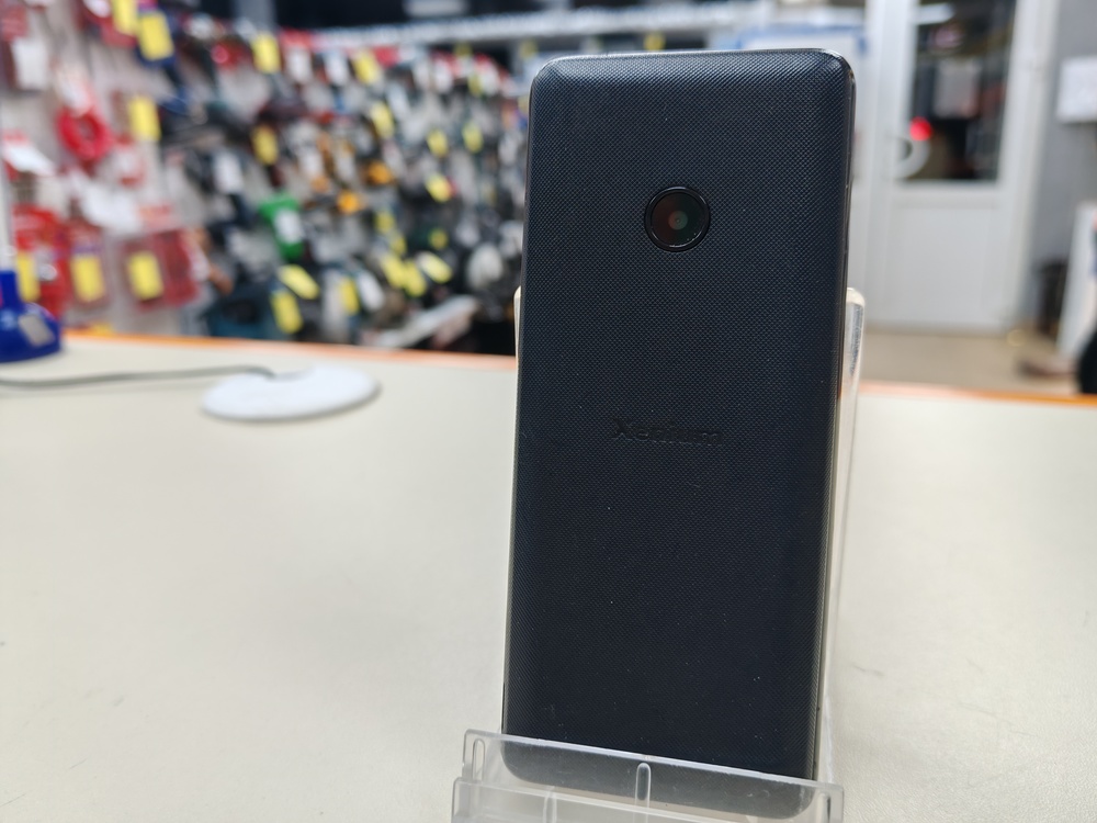 Мобильный телефон Philips Е169