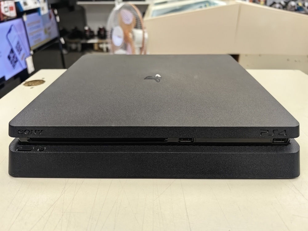 Игровая приставка PlayStation 4 Slim 1Tb Игровая приставка PlayStation 4 Slim 1Tb