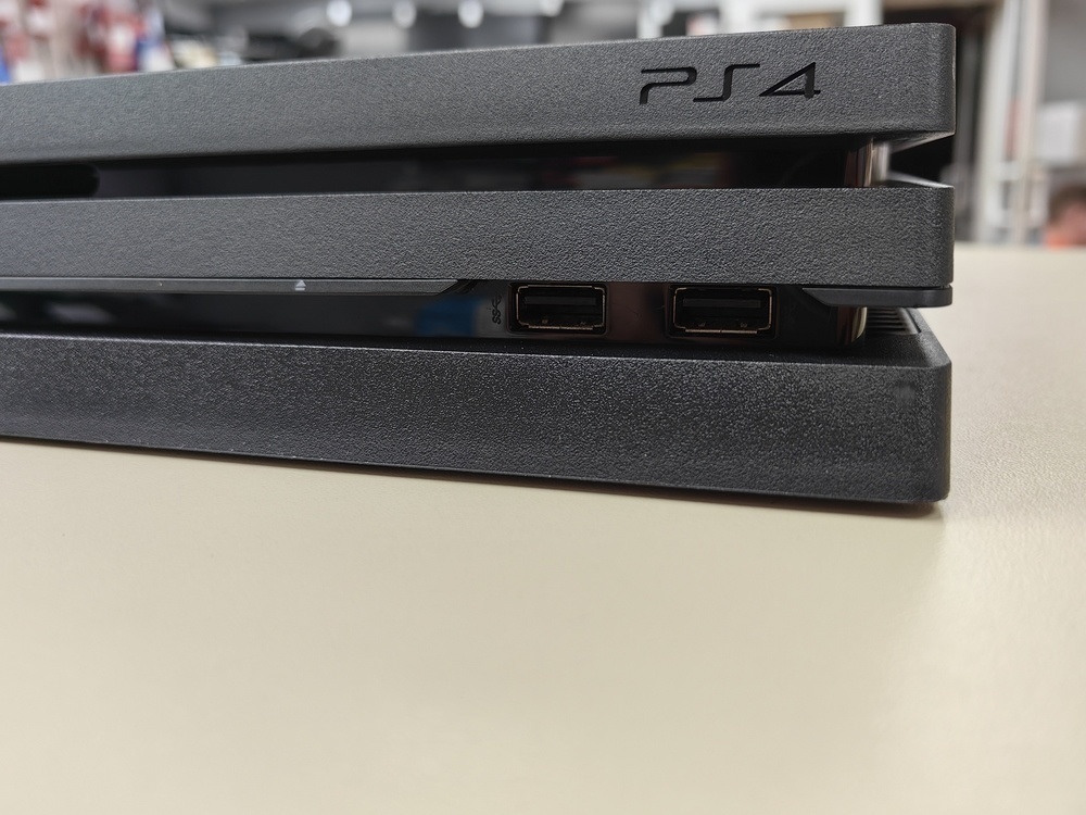 Игровая приставка PlayStation 4 Pro 1Tb Игровая приставка PlayStation 4 Pro 1Tb