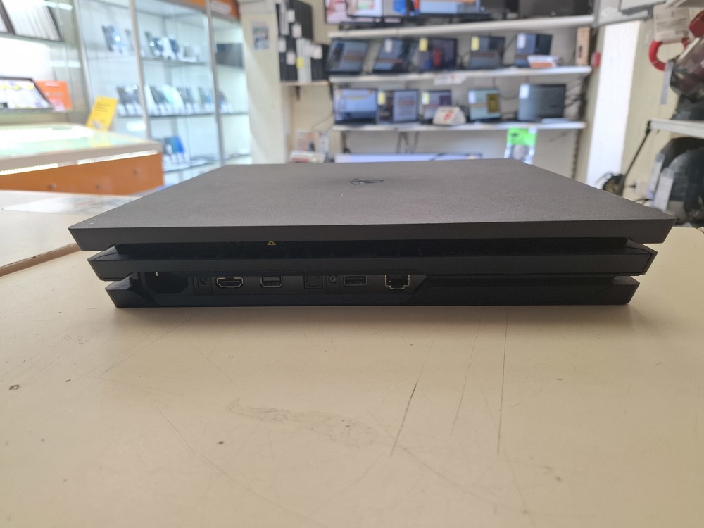 Игровая приставка PlayStation 4 Pro 1Tb Игровая приставка PlayStation 4 Pro 1Tb