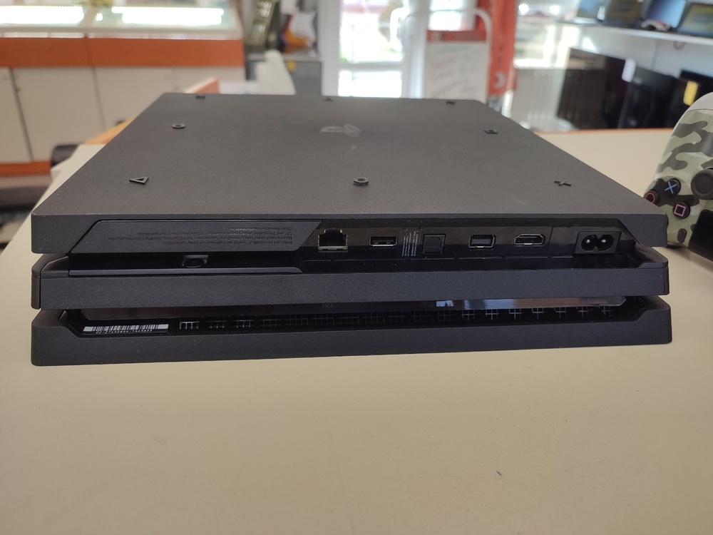 Игровая приставка PlayStation 4 Pro 1Tb Игровая приставка PlayStation 4 Pro 1Tb