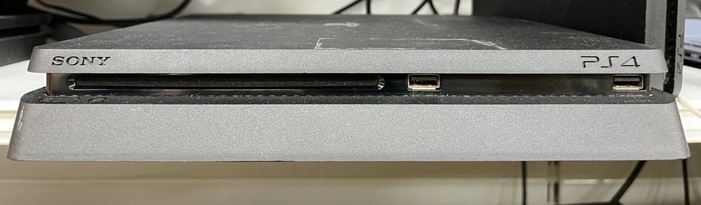 Игровая приставка PlayStation 4 Slim 1Tb Игровая приставка PlayStation 4 Slim 1Tb