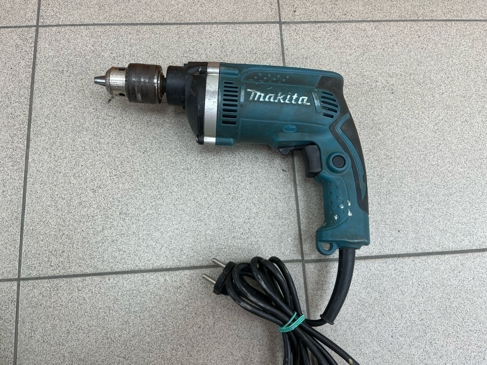 Дрель-ударная Makita HP1640