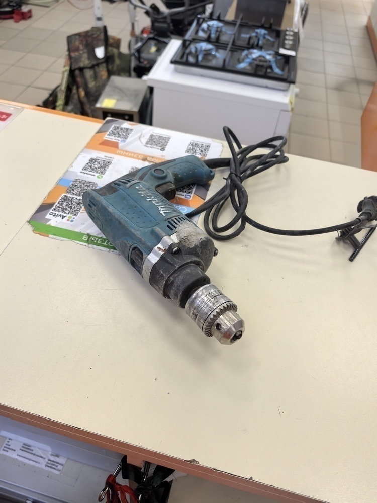 Дрель-ударная Makita HP1630.