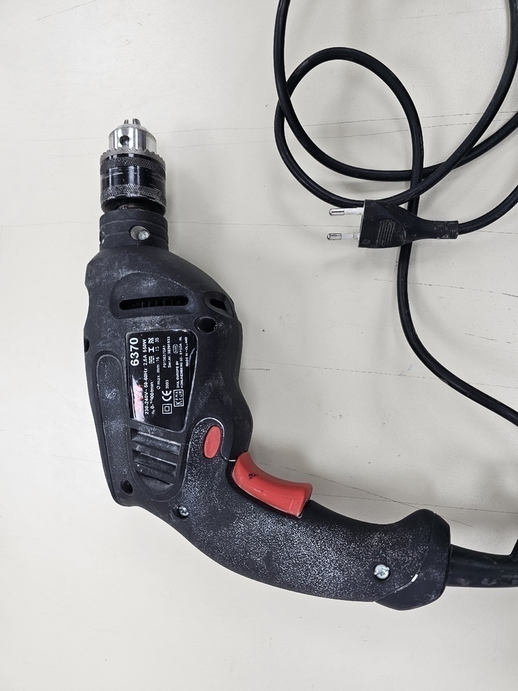 Дрель-безударная Skil 6370