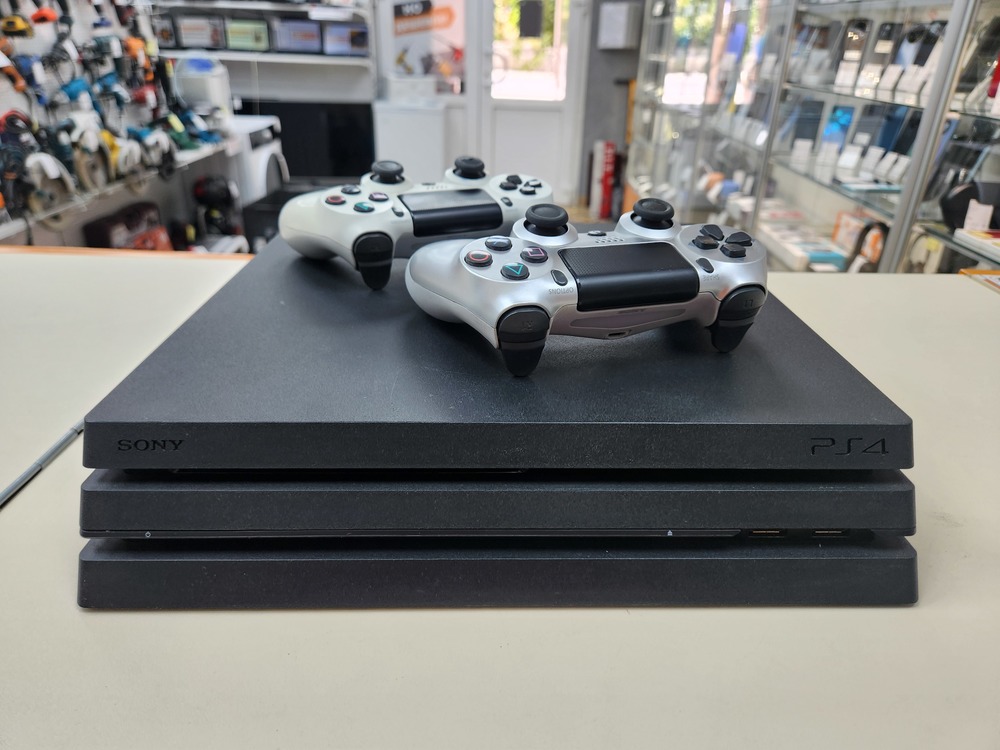 Игровая приставка PlayStation 4 Pro 1Tb Игровая приставка PlayStation 4 Pro 1Tb