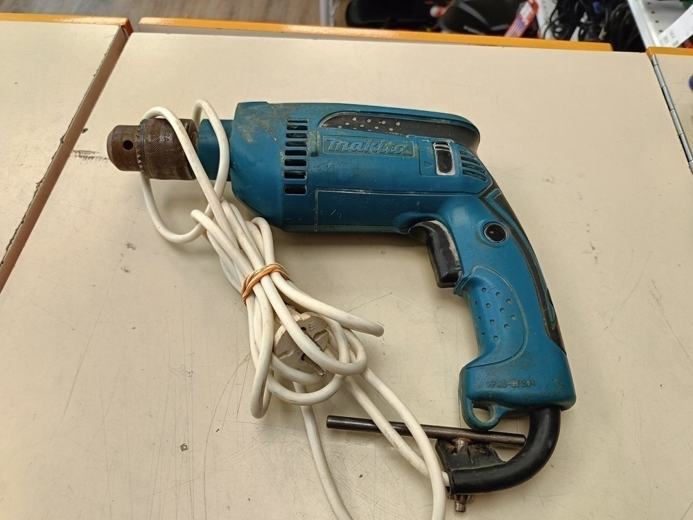 Дрель-ударная Makita HP1640