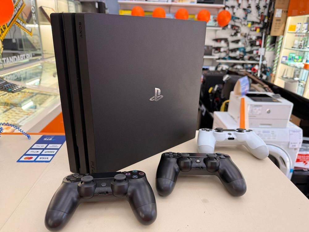 Игровая приставка PlayStation 4 Pro 1Tb Игровая приставка PlayStation 4 Pro 1Tb