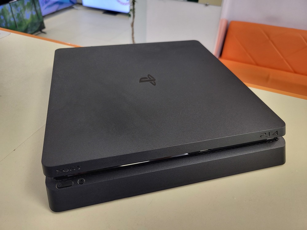 Игровая приставка PlayStation 4 Slim 1Tb Игровая приставка PlayStation 4 Slim 1Tb
