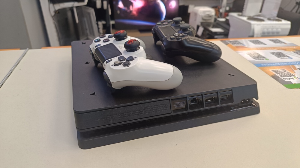 Игровая приставка PlayStation 4 Slim 1Tb Игровая приставка PlayStation 4 Slim 1Tb