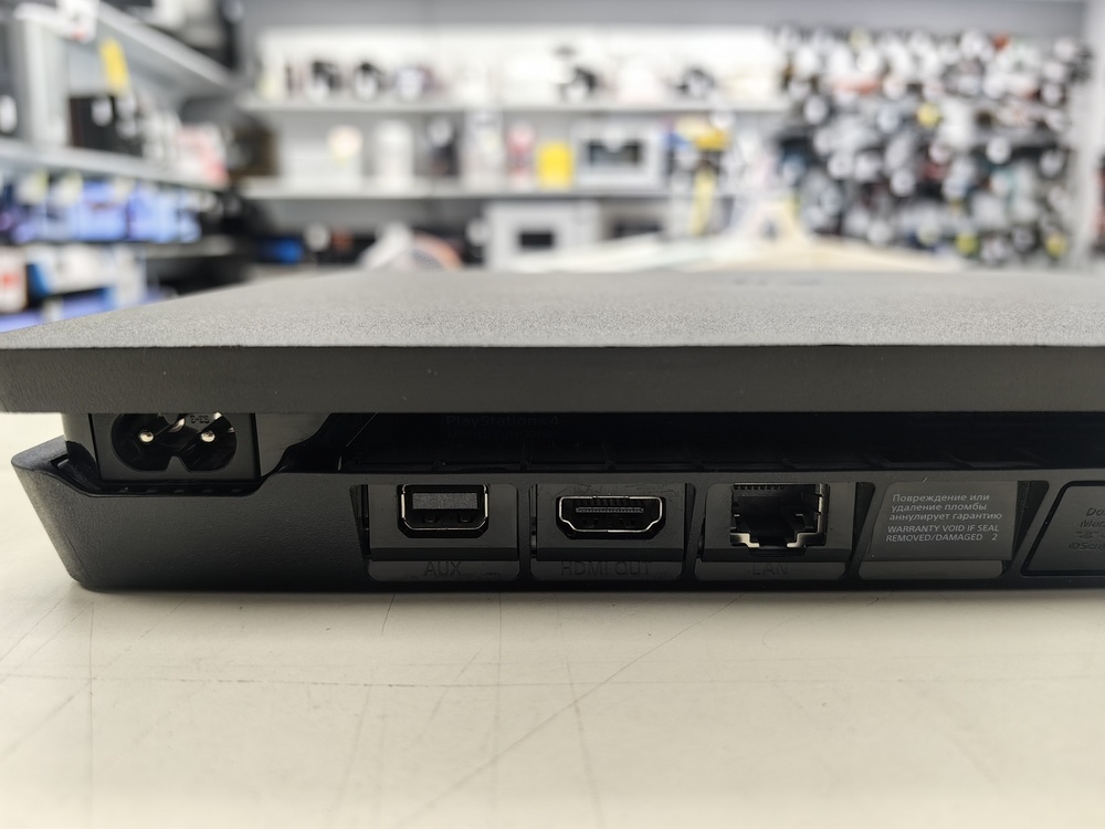 Игровая приставка PlayStation 4 Slim 1Tb Игровая приставка PlayStation 4 Slim 1Tb