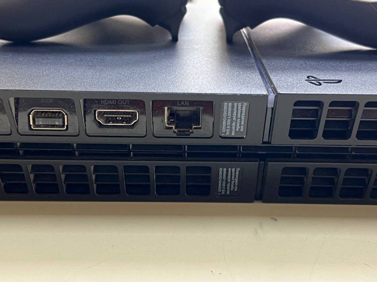 Игровая приставка PlayStation 4 FAT 1Tb