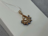 ПОДВЕСКА С КАМНЯМИ (Au 585)