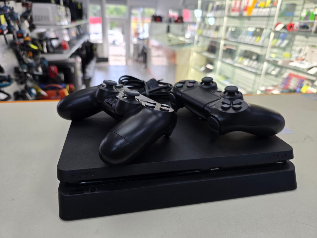 Игровая приставка PlayStation 4 Slim 1Tb Игровая приставка PlayStation 4 Slim 1Tb