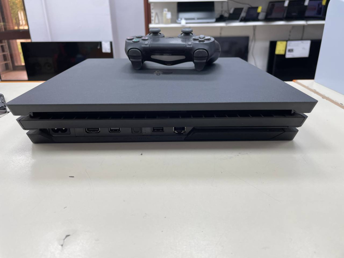Игровая приставка PlayStation 4 Pro 1Tb Игровая приставка PlayStation 4 Pro 1Tb
