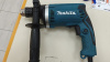 Дрель-ударная Makita HP1630.