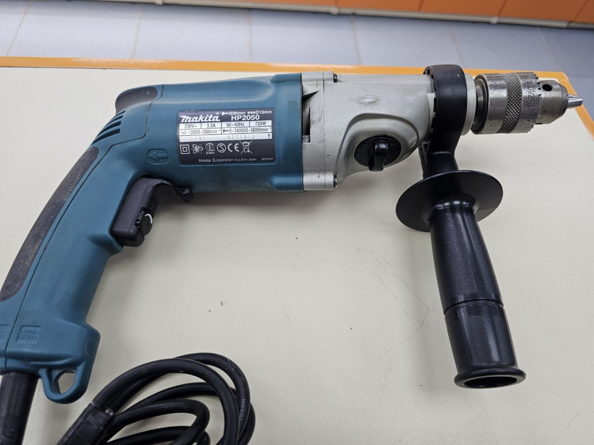 Дрель-безударная Makita HP 2050